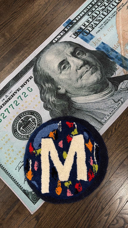 Millions ( M logo ) RUG